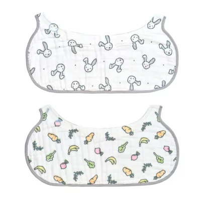 2 in 1 non slip burp coth and bib on white background. Top bib has a grey bunny pattern. Bottom bib has colorful vegetables pattern.